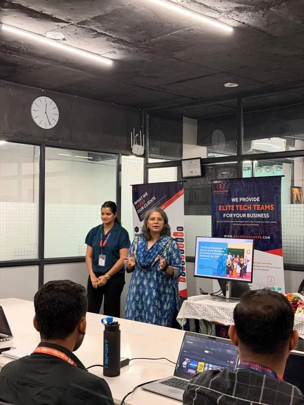A colleague presenting at a learning session